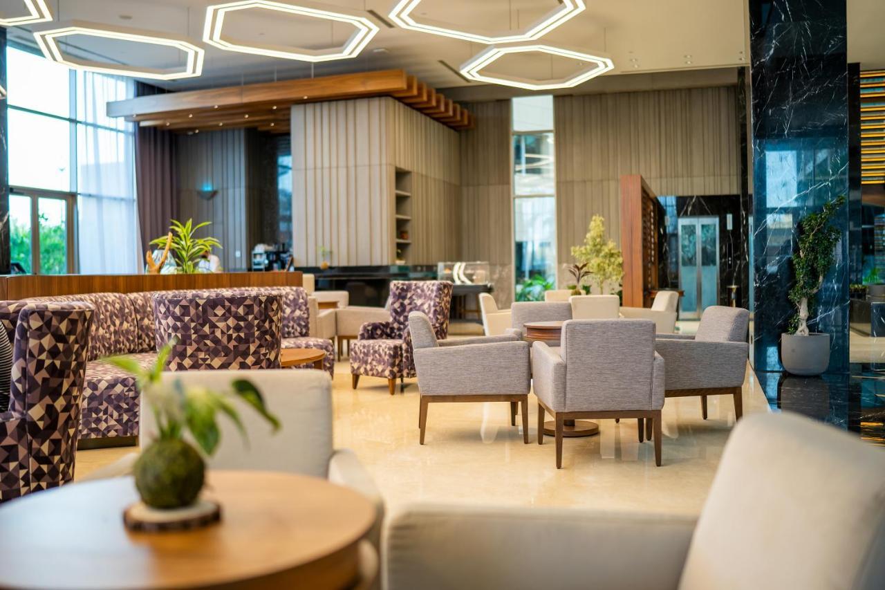 Grand Millennium Al Seef Basra Extérieur photo
