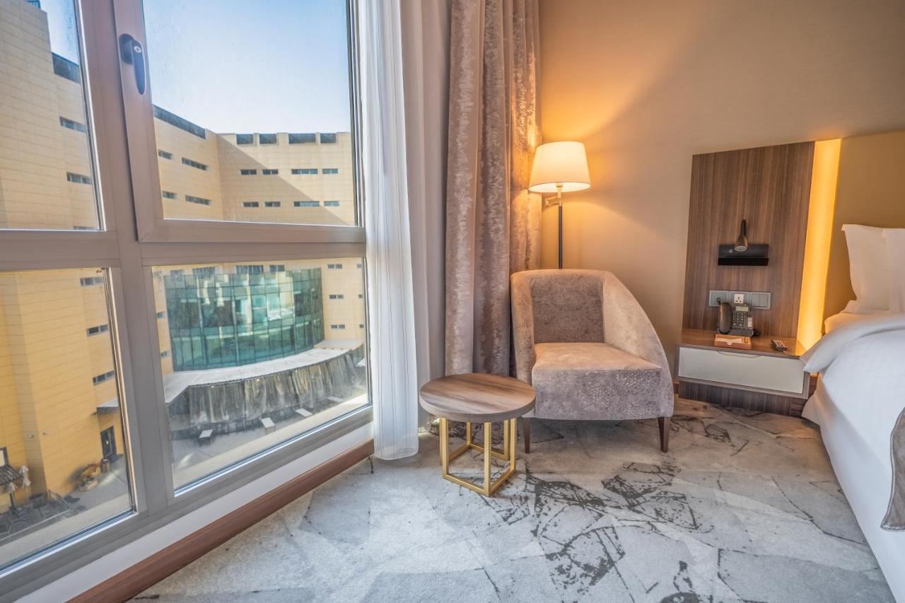 Grand Millennium Al Seef Basra Extérieur photo